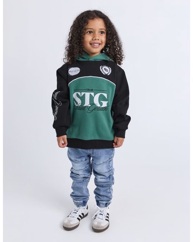 A 3-7 year old full body view of the Owners Club Hood. Matching it back with her favourite pair of jeans 