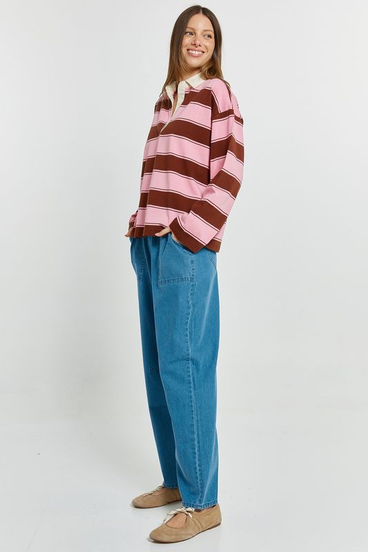 side view of women wearing the Betty Basics Roland Rugby Top a boxy oversized fit 