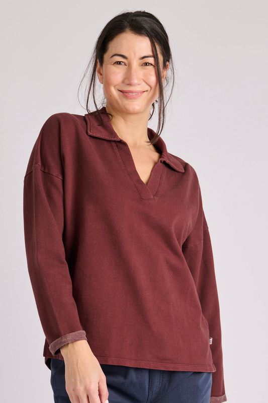 Female model wearing the Collared Crew showing the Chocolate colour and the low V neck collar