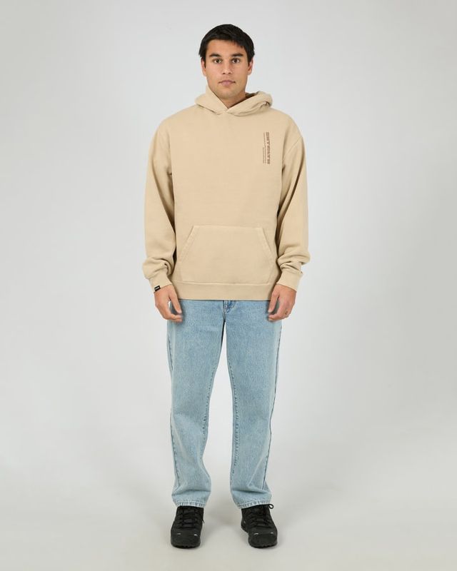 Full length view of the  St Goliath Compressor Hoodie in Sand featuring a small brown st goliath logo