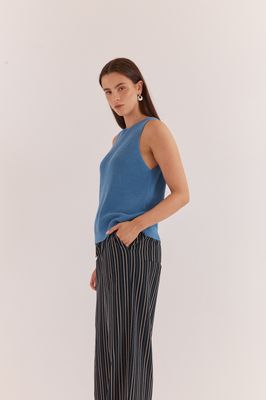 Side view of a womens wearing the Sass Kiani Knit Tank in Blue in a blue colour way in a singlet shape style