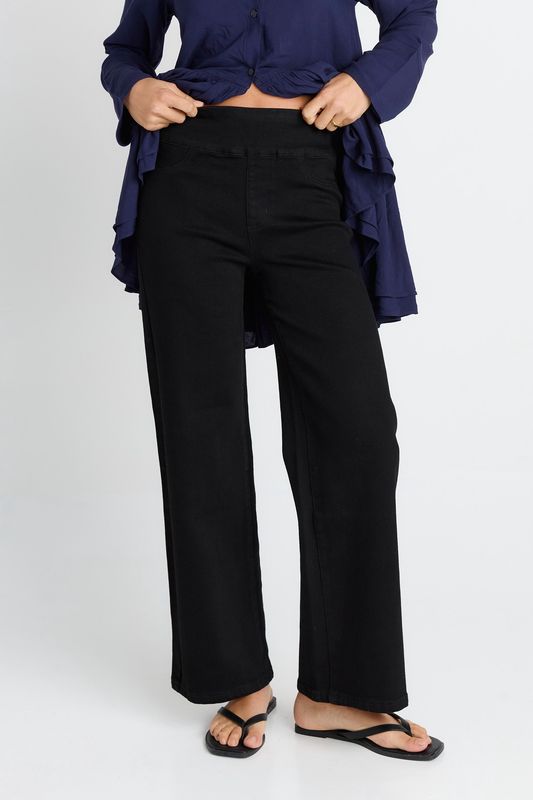 Close up of the Straight Stretch Jean in Black showing the straight legged fit and two nonfunctional pockets for the look