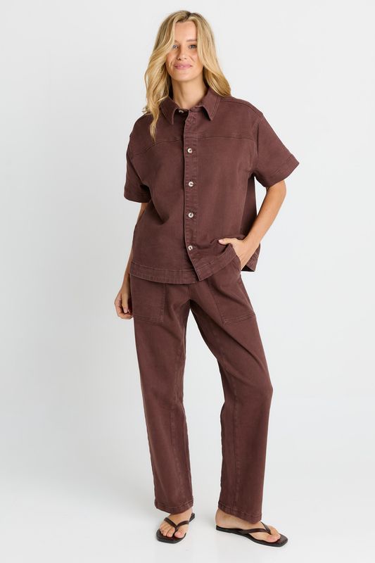A full body view of the Betty Basics Quinn Cotton Shirt, pairing it with some matching bottoms for that completed look.
