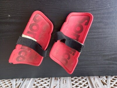 Red Shin Guards