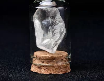 White crystal in glass jar
