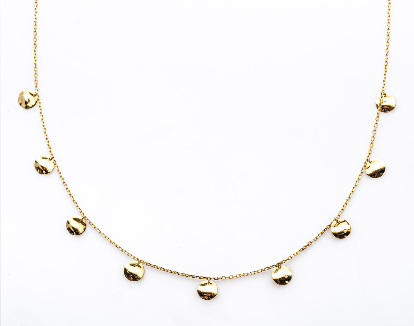 Collier 9 petits ronds positionnés en breloques