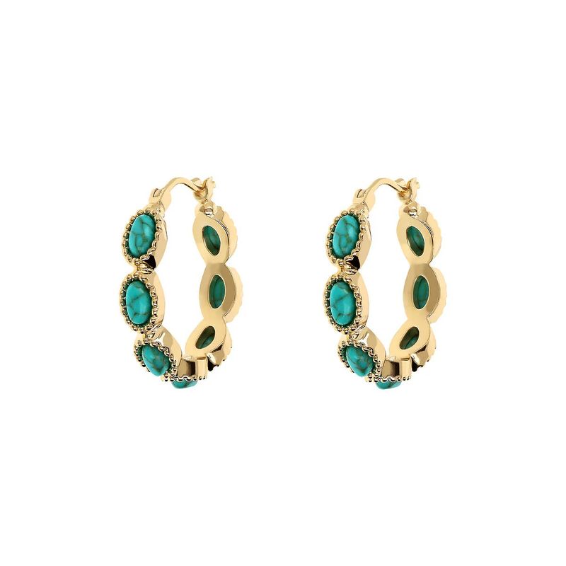 Boucles d&#39;oreilles créoles travaillées avec de la pierre turquoise naturelle