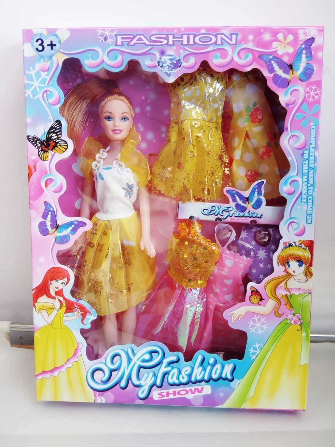 Muñeca con vestidos