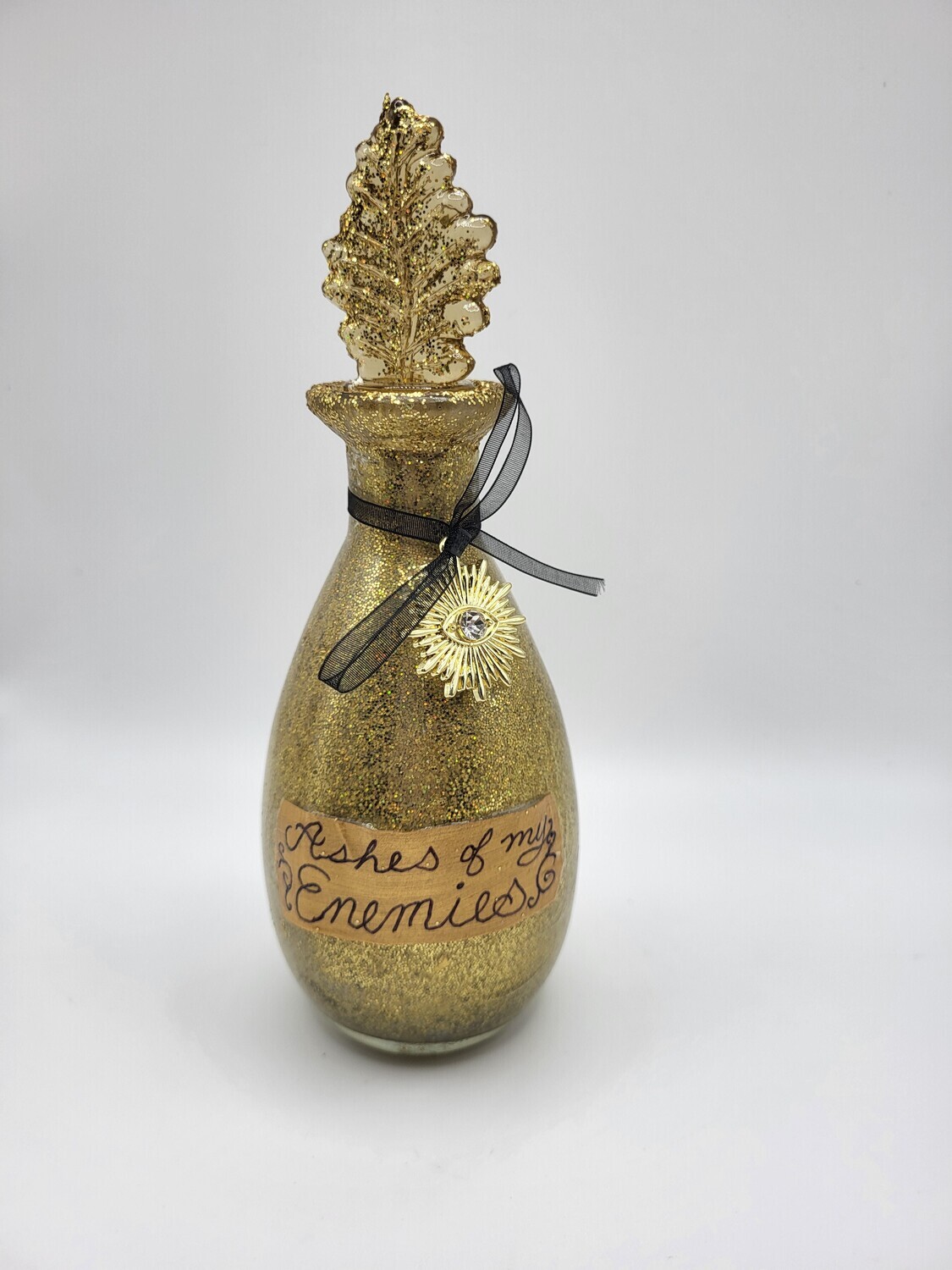 Gold "Ashes of my Enemies" bottle 1