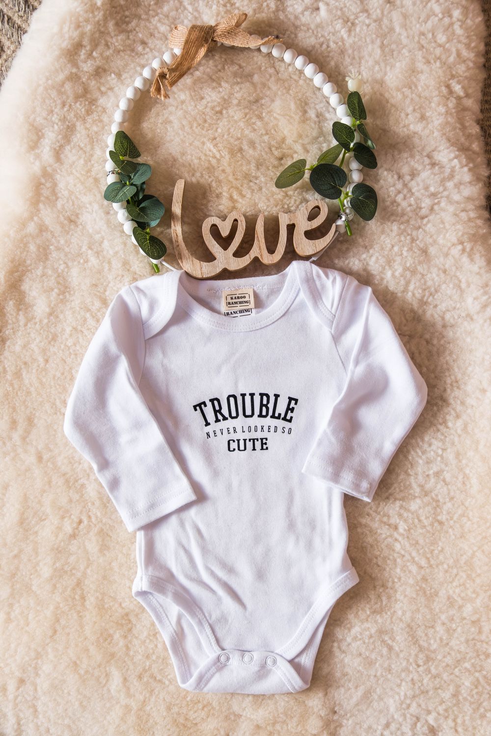 BABY GROWS (TROUBLE NEVER LOOKED SO CUTE)