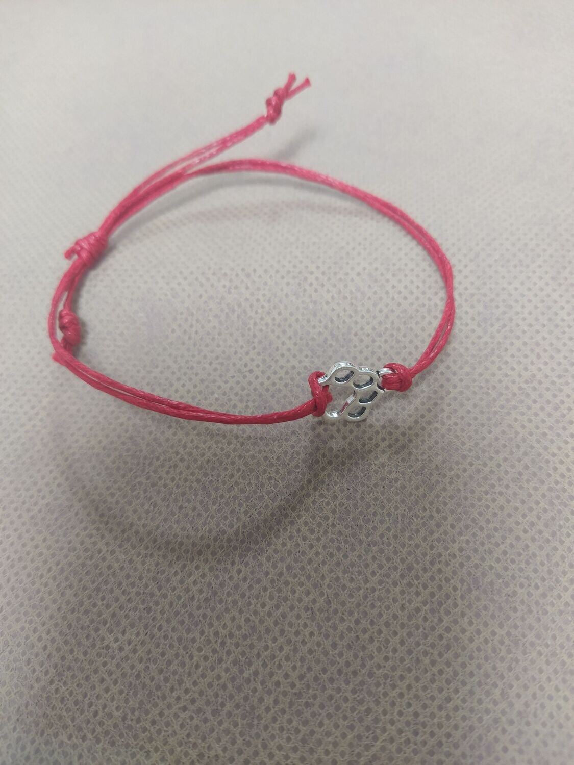 PULSERA HUELLA PEQUEÑA FUCSIA (unidad)