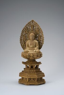 Kusunoki Shakyamuni (楠木九重八角台飛天光背眼入切金付釈迦)