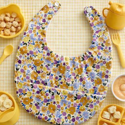 Bavoir imperméable avec récupérateur