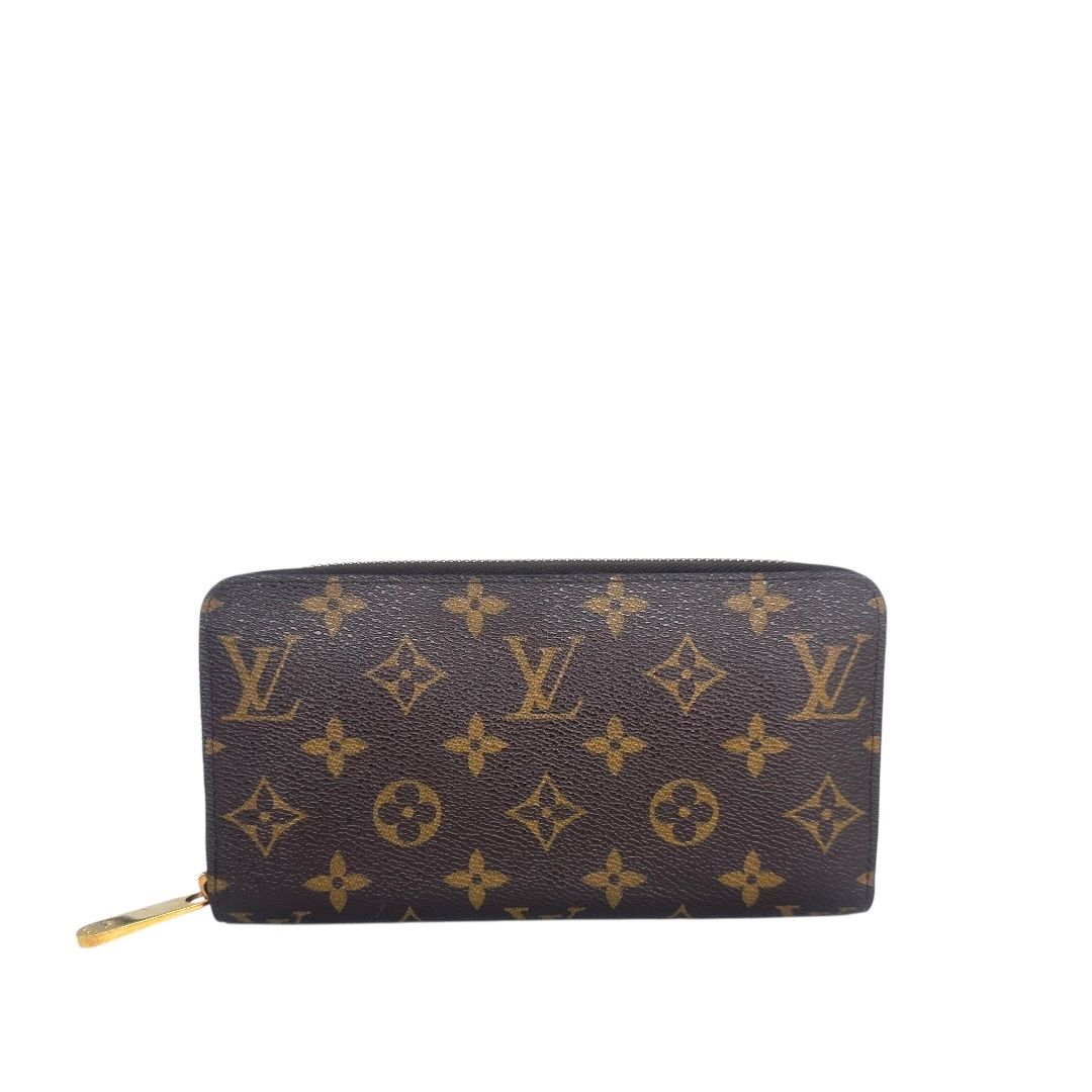 Louis Vuitton Monogram Zippy Wallet.