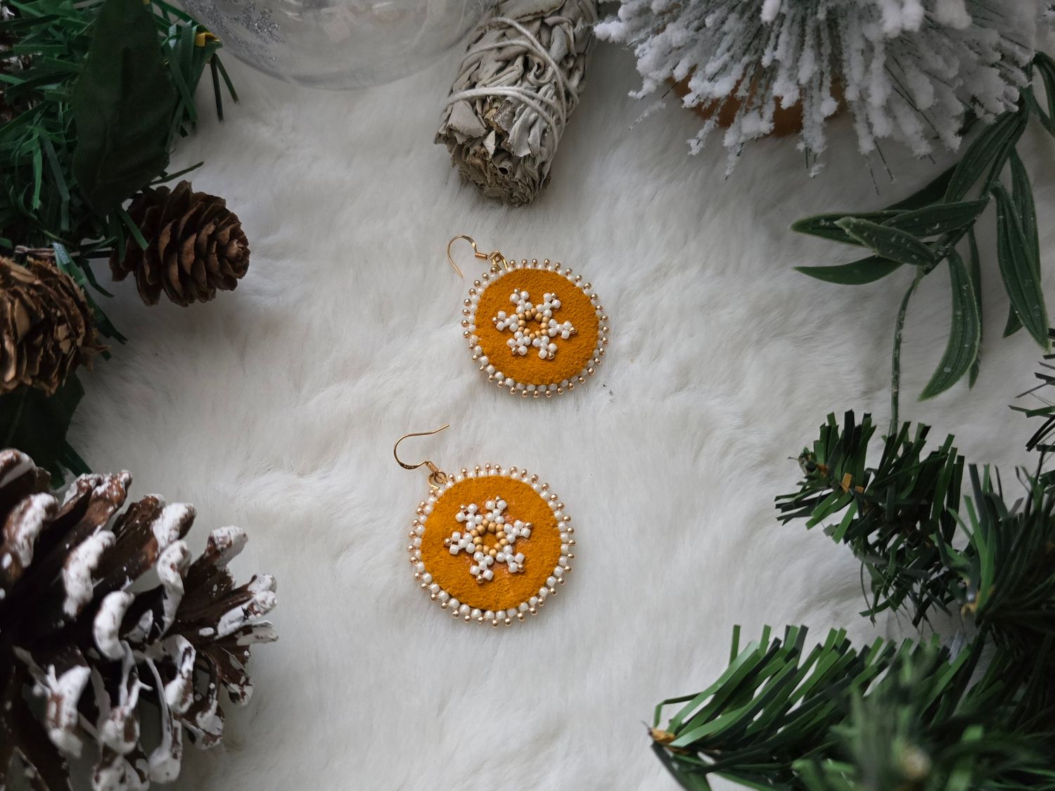 Simple snowflake on tanned deer hide