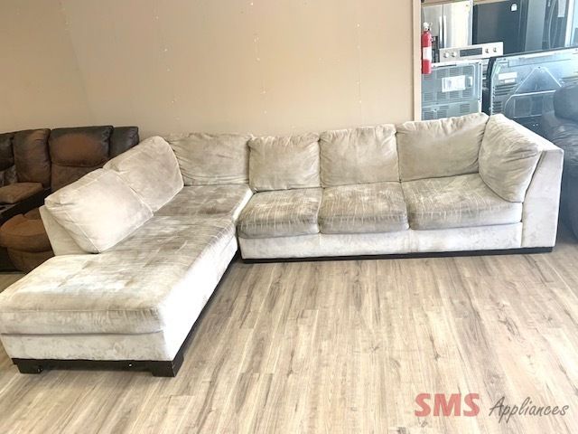 2-piece sectional. Dimensions for one piece: H- 31”, W- 85”, D- 38”