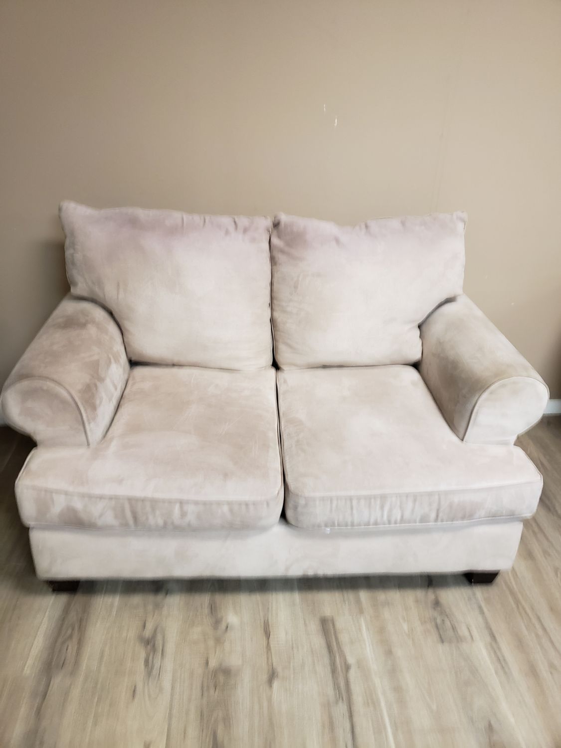 Beige love seat