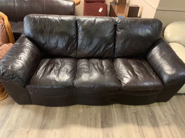 Brown leather couch. Very comfy
