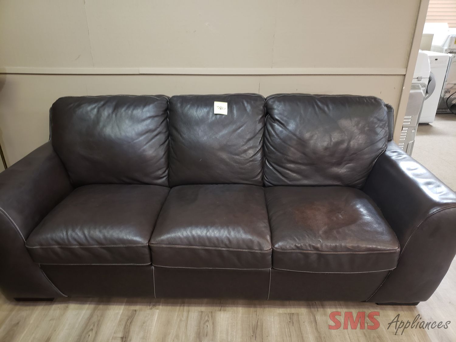 Brown leather sofa, very comfy ,H-36",W-88",D-40"