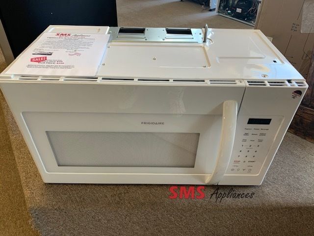 Frigidaire 1.8 Cu. Ft. Over-The-Range Microwave Open Box. M/N: FMOS1846BW