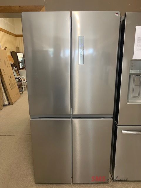 Open Box Frigidaire Scratch & Dent refrigerator. 4 Door  33 inch. M/N: FRQG1721AV.  17.4 cu. ft. Capacity