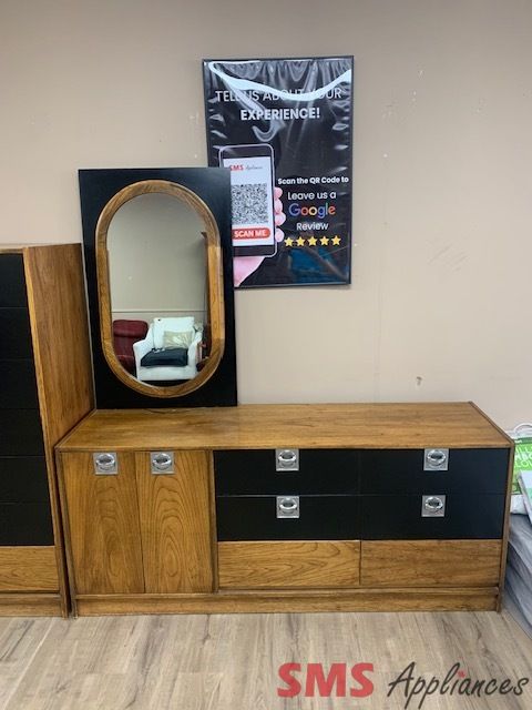 Black and Brown Dresser with a mirror