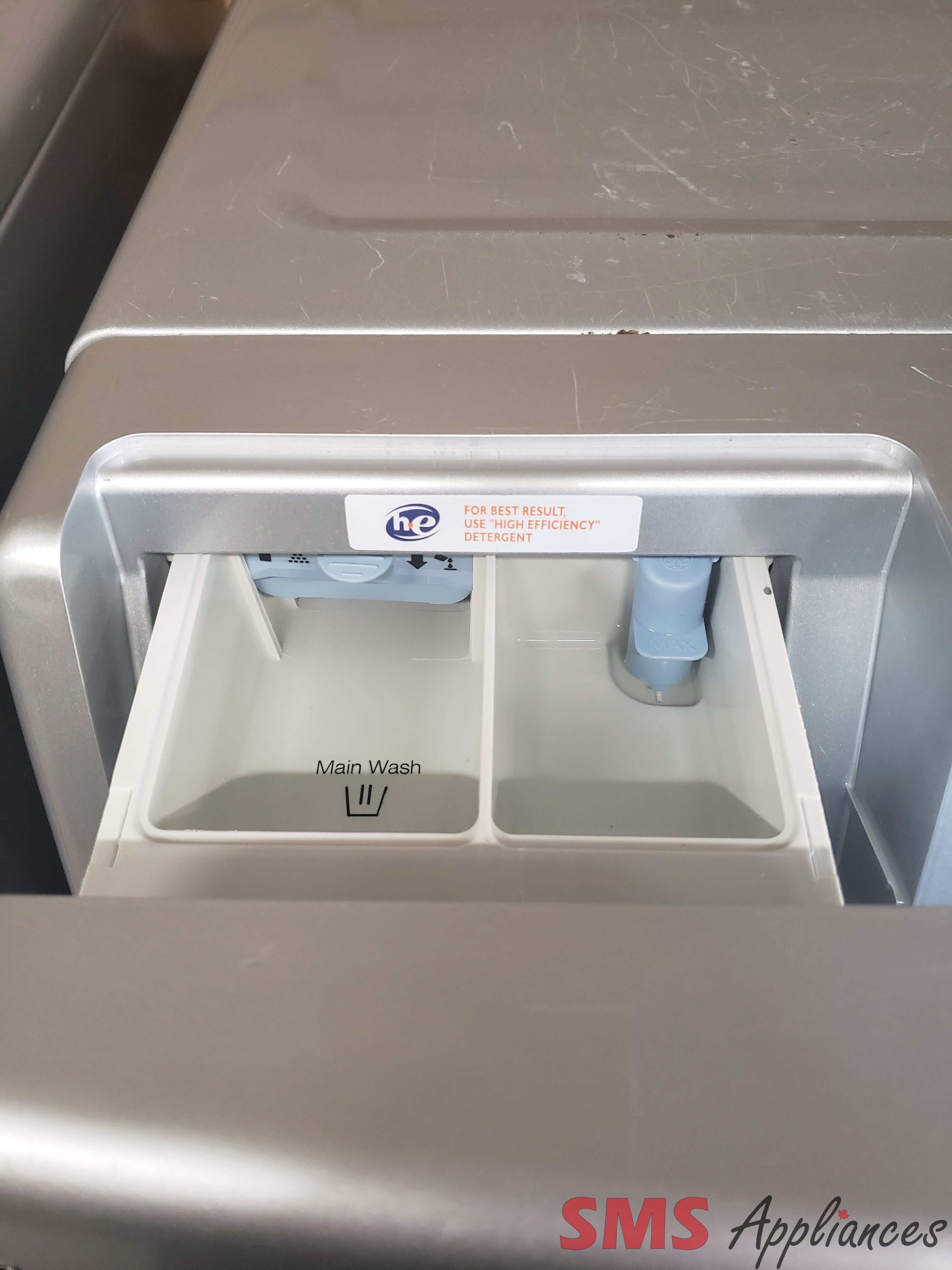 Samsung Washer and Dryer Set WF206ANS/DV206AES with a pedestal