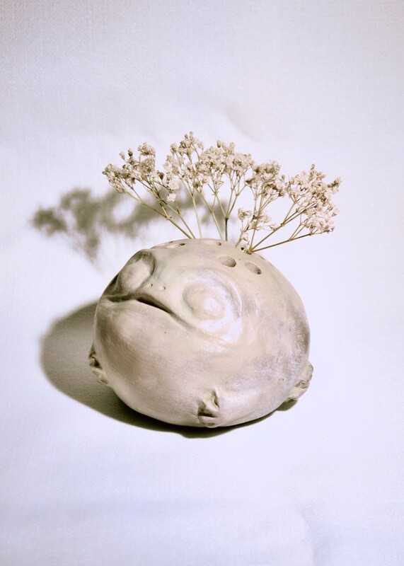 Pit fired flower frog