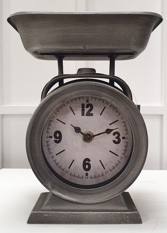 Orologio a forma di bilancia