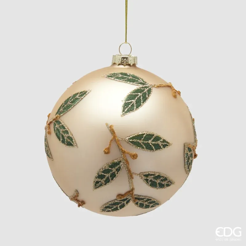 Golden Christmas ball with green patterns