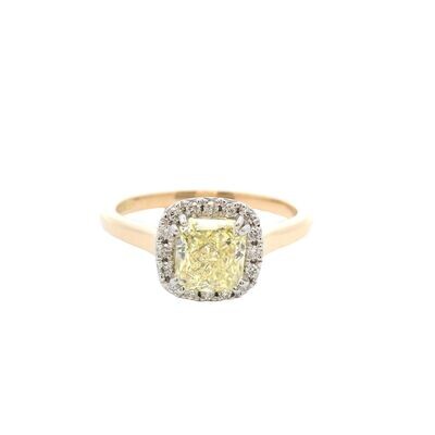A Fancy Yellow Radiant Cut Diamond 'Halo' Engagement Ring 18 Carat Gold