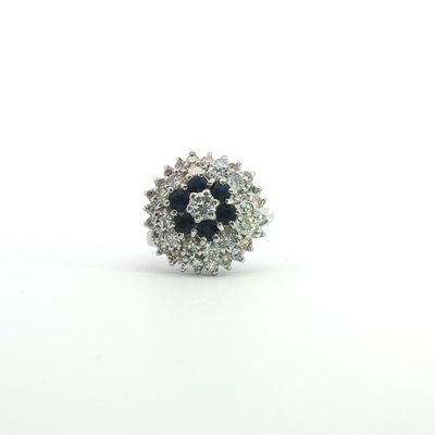 A Pre-Owned Sapphire And Diamond Cluster Ring