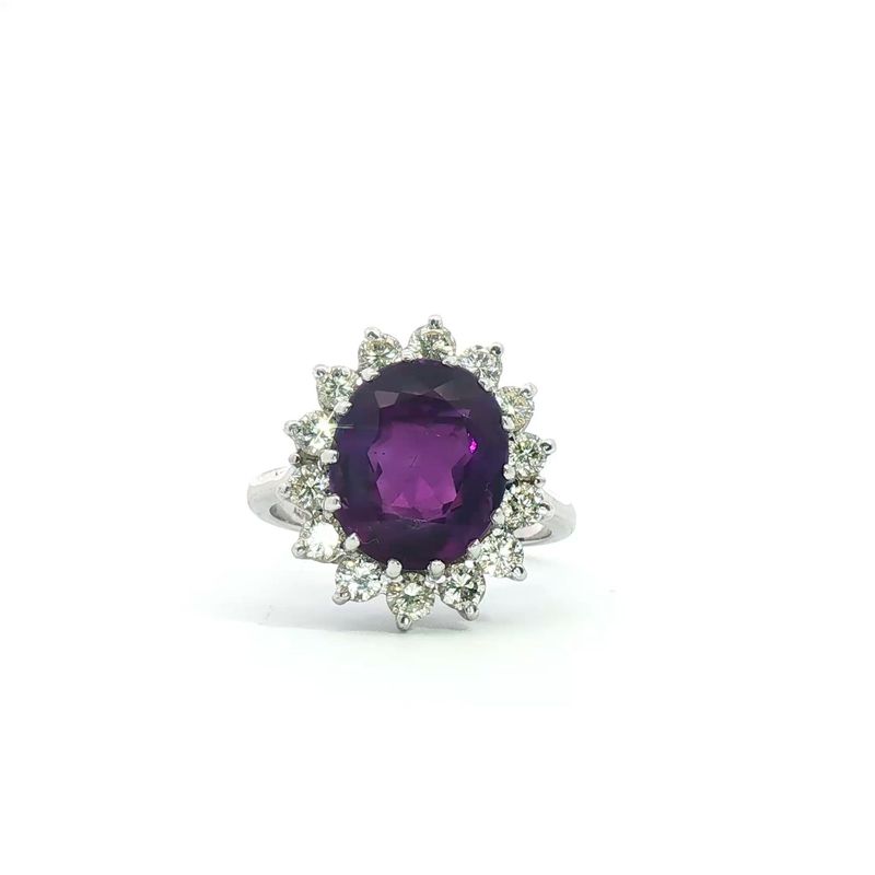A Pre-Owned Amethyst and Diamond Cluster RIng A Pre-Owned Amethyst and Diamond Cluster RIng