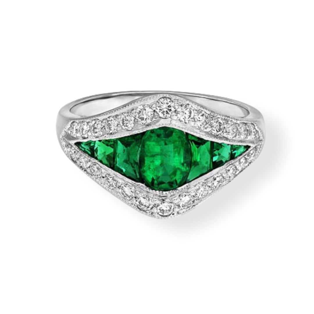 A Platinum Emerald And Diamond Dress Ring