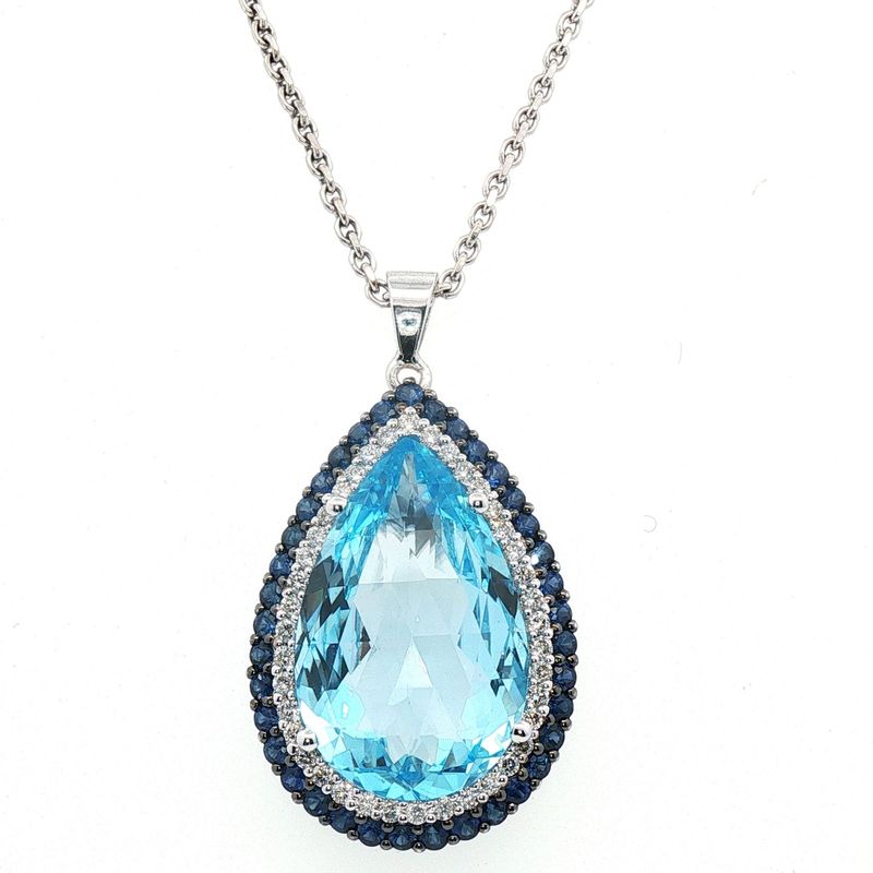18 Carat White Gold Blue Topaz, Natural Diaonds and Sapphire Pendant 18 Carat White Gold Blue Topaz, Natural Diaonds and Sapphire Pendant