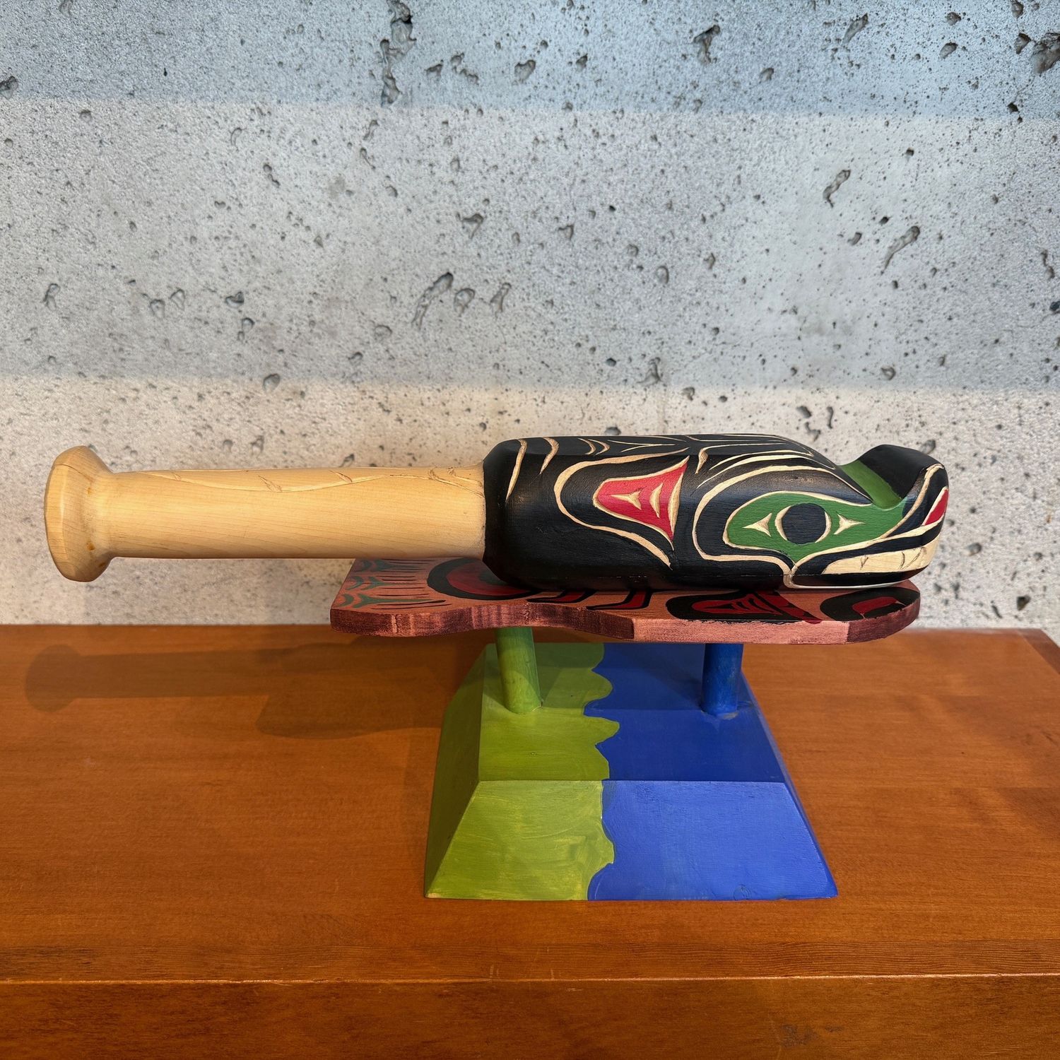 RATTLE AND STAND CARVED BY ART HARRY