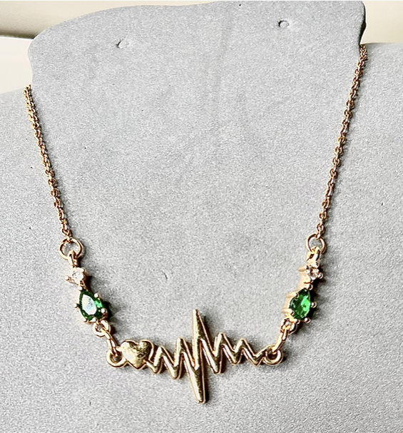 Gold plated and Emerald toned Crystal Heartbeat Necklace