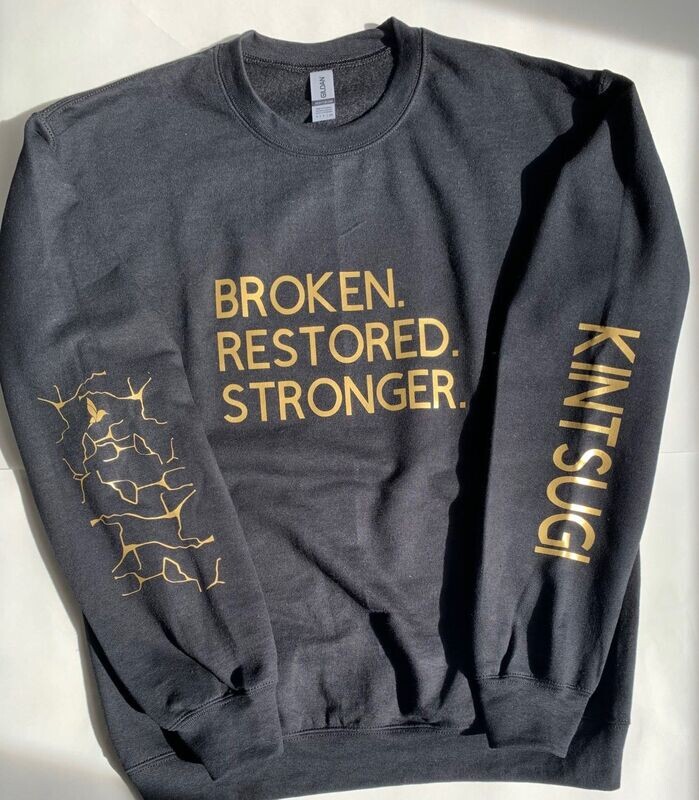 BROKEN.RESTORED.STRONGER. Crewneck