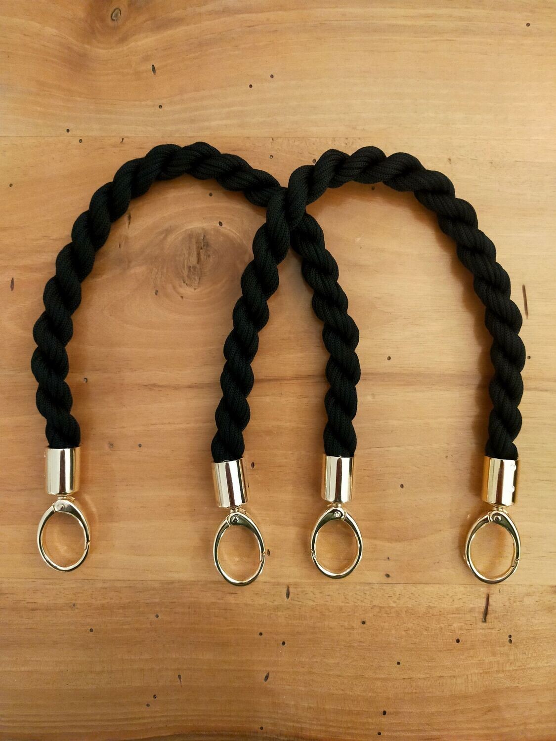 Manici intrecciati con moschettoni