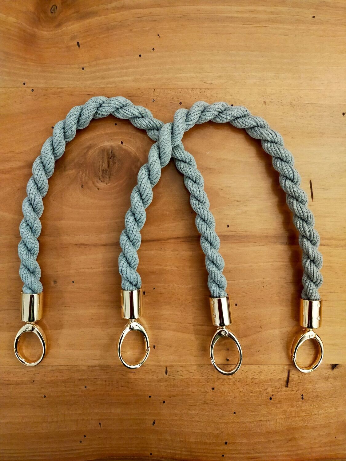 Manici intrecciati con moschettoni