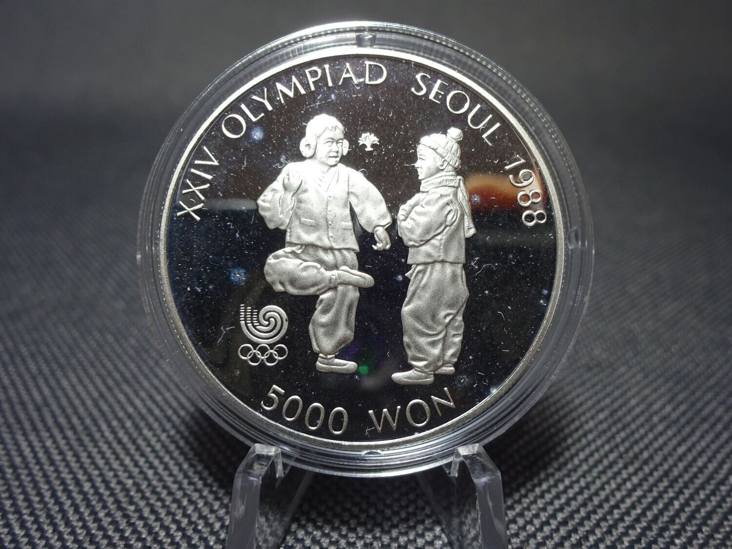 Silbermünze Südkorea 1987 5000 Won Olympia 1988 Seoul Jegi Chagi PP Proof 1/2 Oz Unze Silbermünze Südkorea 1987 5000 Won Olympia 1988 Seoul Jegi Chagi PP Proof 1/2 Oz Unze