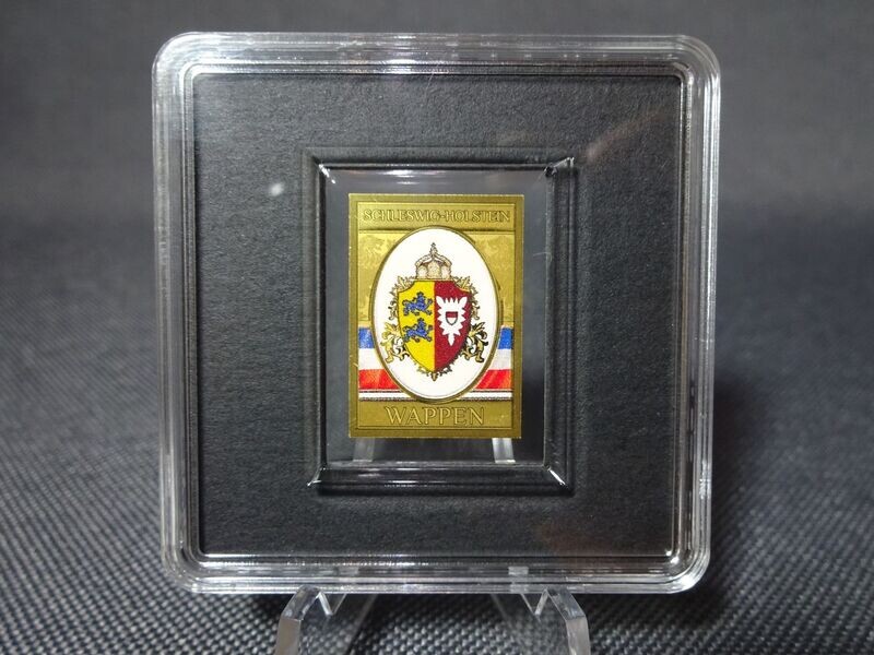 Goldmünze Tschad 3000 Francs Schleswig Holstein Wappen Farbe Goldbarren 1/500 Oz Unze Goldmünze Tschad 3000 Francs Schleswig Holstein Wappen Farbe Goldbarren 1/500 Oz Unze