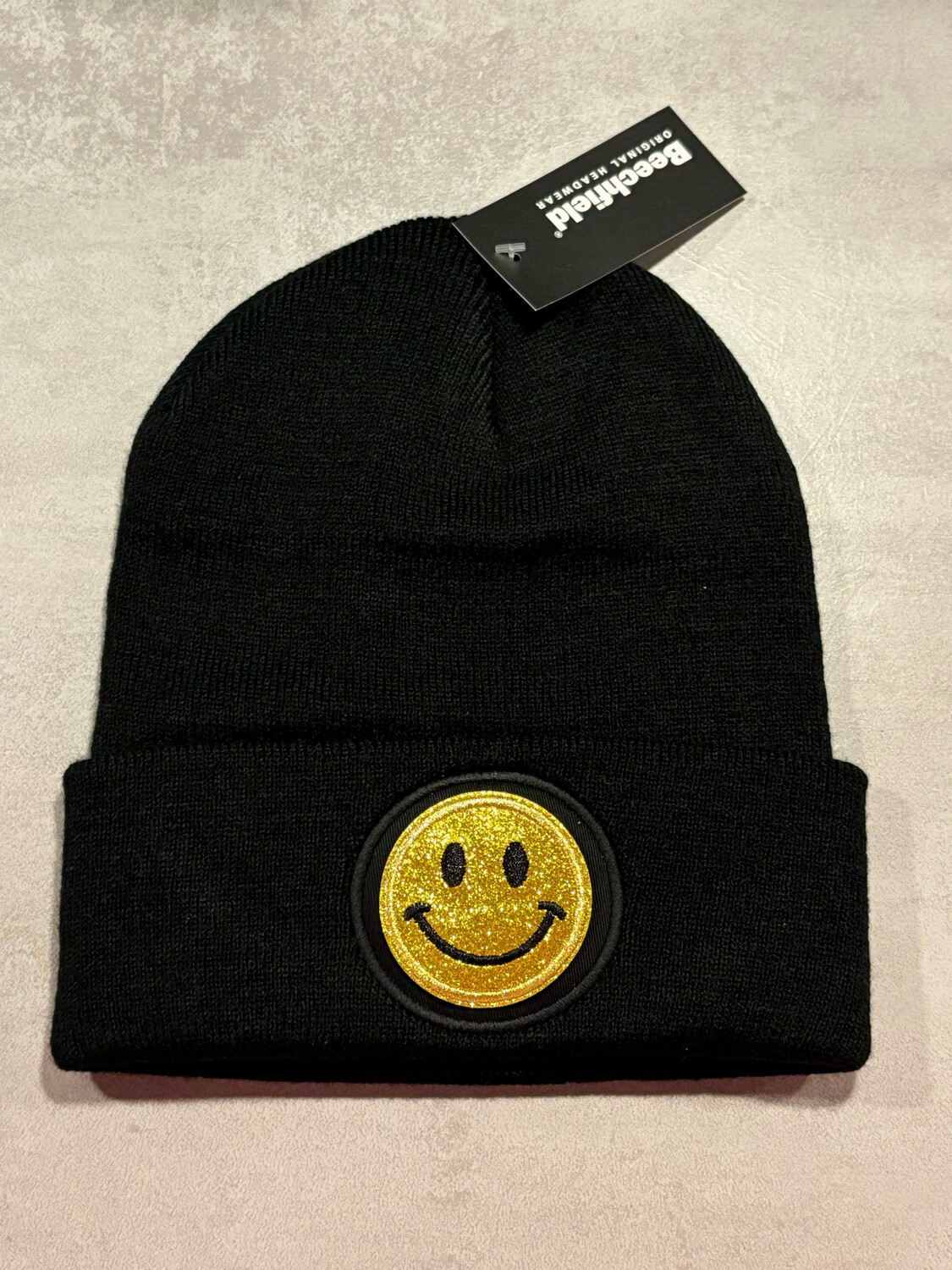 Muts/Beanie Zwart Smiley Glitter Geel