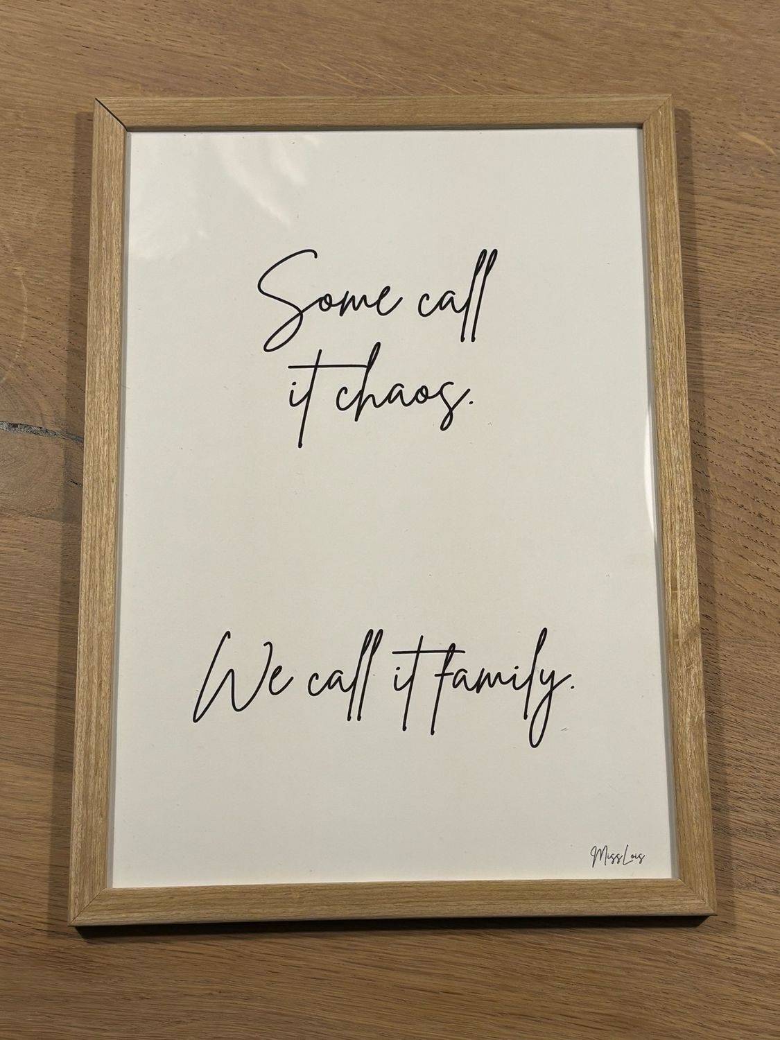 Poster Quote met lijst "Some call it Chaos, we call it Family"