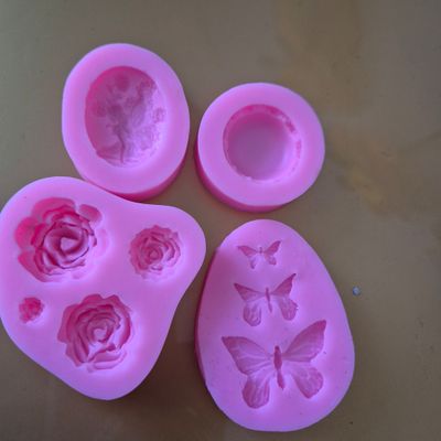 Group of 4 pink molds