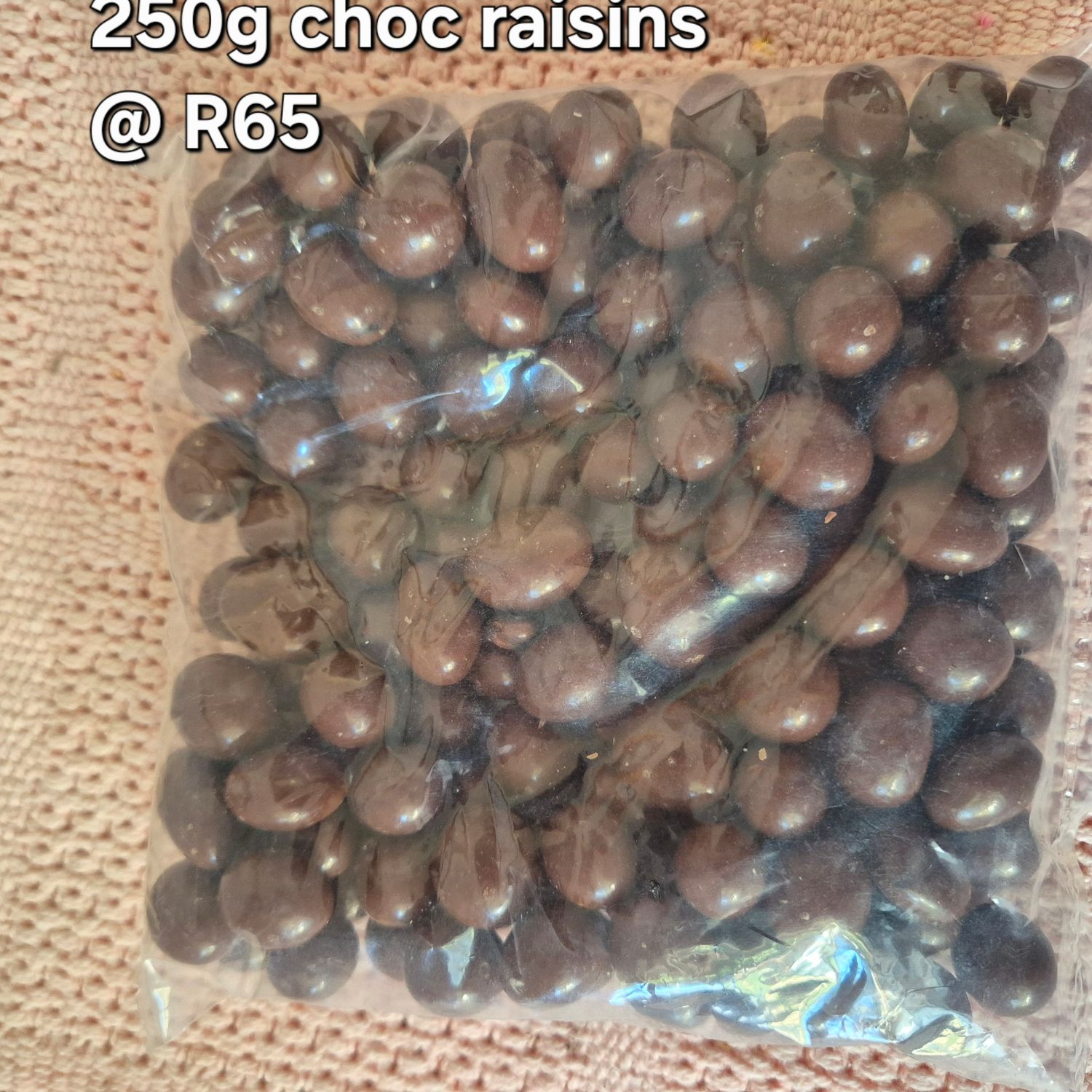 Raisin coated with chocolate