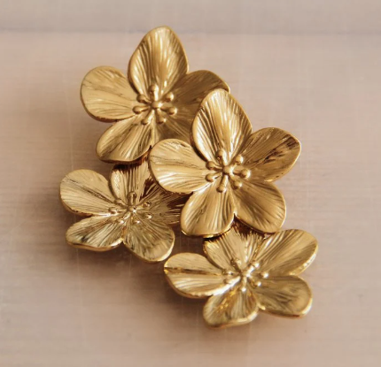 RVS statement oorbel 2 bloemen - goud