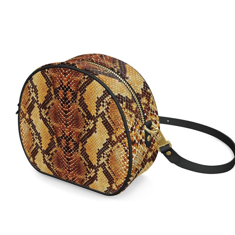 Ladies handmade luxury leather round box bag in snakeskin print