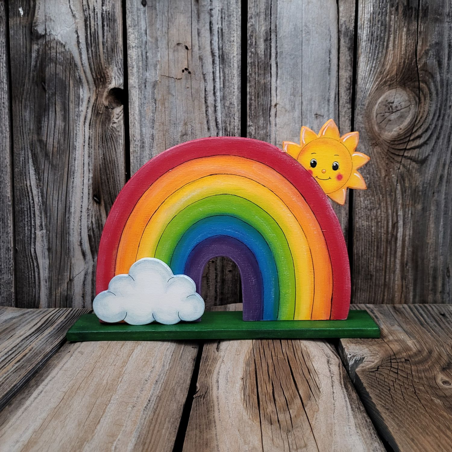 RegenBogen mit kleinem Sonnenschein