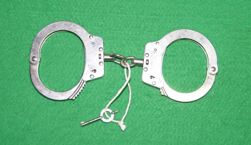 ​Hiatt's 1970s Adjustable Police Handcuffs
